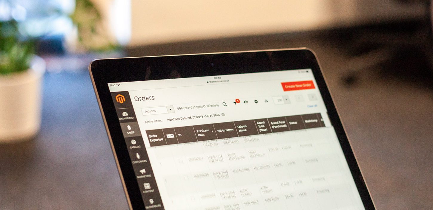 magento intergration being shown on an ipad in an office setting