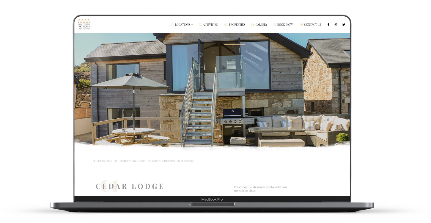 Hand Picked Retreats website home page displayed on a laptop
