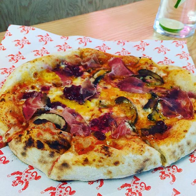 Courgette and parma ham pizza