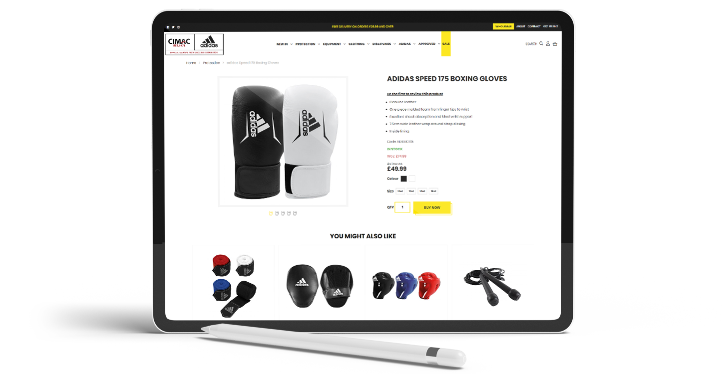 Cimac boxing glove product page displayed on an upright ipad with a stylus in front of it