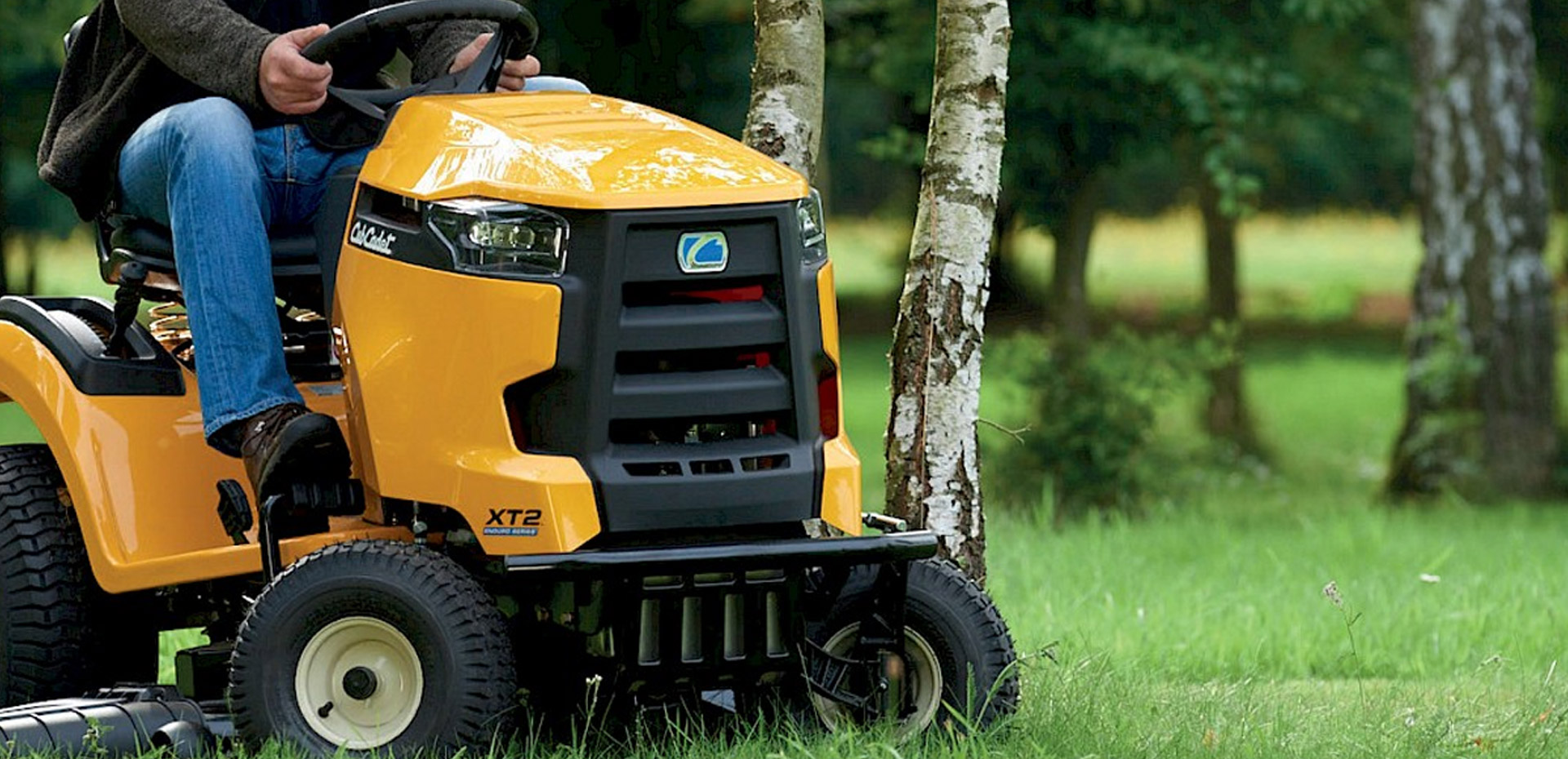 A Golf Club with a Garden Maintenance person on the Cub Cadet XZ2 mower.