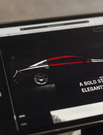 Car UX web design displayed on an ipad